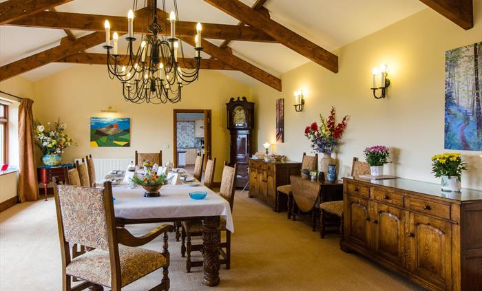 The Dining Room and the dining table set for breakfast.